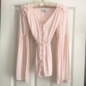 Soft pink vintage style blouse.